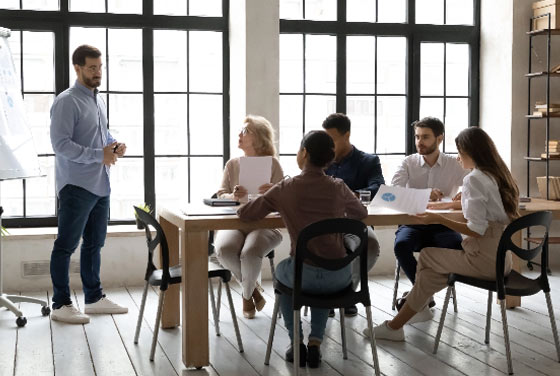Employer discussing education advantages with prospective students