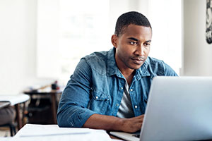 Male using online tutoring service