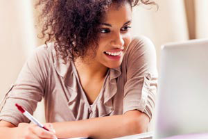 a woman using the student portal